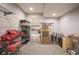 Finished basement features carpet flooring and ample storage space, perfect for a hobby area at 15594 Garrano Ln, Fishers, IN 46040