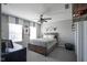 Serene bedroom featuring neutral colors, a comfortable bed, and plenty of natural light creating a calming retreat at 15594 Garrano Ln, Fishers, IN 46040