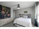 Stylish bedroom with modern décor, a comfortable bed, and ample natural light from the window at 15594 Garrano Ln, Fishers, IN 46040