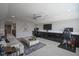 Versatile bonus room featuring built-in storage, comfortable seating, and ample space for various activities at 15594 Garrano Ln, Fishers, IN 46040