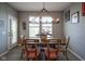Dining room features a modern chandelier, natural light, and decor for stylish meals at 15594 Garrano Ln, Fishers, IN 46040