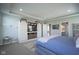 Spacious main bedroom boasts modern storage, tray ceiling, and ensuite bathroom access at 15594 Garrano Ln, Fishers, IN 46040
