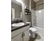 Bathroom with a tiled floor, a white vanity with a dark countertop, and a shower-tub combination at 1583 Valdarno Dr, Greenwood, IN 46143