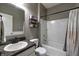 Clean bathroom featuring a shower-tub combination and a sink with granite countertop at 1583 Valdarno Dr, Greenwood, IN 46143