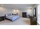 Bright Primary bedroom with a large bed, comfortable furnishings, and a view to the outside at 1583 Valdarno Dr, Greenwood, IN 46143