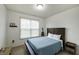 Cozy bedroom with a full sized bed, carpet, and natural light at 1583 Valdarno Dr, Greenwood, IN 46143