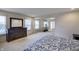 Bedroom featuring plenty of natural light, adjacent to a living area at 1583 Valdarno Dr, Greenwood, IN 46143