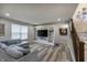 Spacious living room features built-in shelving, a comfortable couch, and stairs at 1583 Valdarno Dr, Greenwood, IN 46143