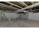 Unfinished basement with ladder and block wall at 1623 N Centennial St, Indianapolis, IN 46222