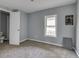 Bedroom with a window and closet space at 1623 N Centennial St, Indianapolis, IN 46222