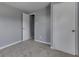 This bedroom features carpet and a closet at 1623 N Centennial St, Indianapolis, IN 46222