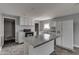Bright, airy kitchen featuring modern appliances, ample counter space, and stylish gray floors at 1623 N Centennial St, Indianapolis, IN 46222