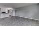 Bright kitchen and expansive gray tile floor at 1623 N Centennial St, Indianapolis, IN 46222