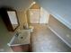 Angle shot of bathroom with vinyl flooring, sink, toilet, and shower/tub combo at 1626 S State Ave, Indianapolis, IN 46203