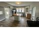 Bright kitchen with laminate floors, center island, stainless appliances, and great natural light at 1626 S State Ave, Indianapolis, IN 46203
