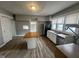 Spacious kitchen with laminate floors, center island, stainless appliances, and great natural light at 1626 S State Ave, Indianapolis, IN 46203
