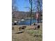 Beautiful backyard with lake access and a cozy fire pit area at 1647 S Plateau Cir, Martinsville, IN 46151