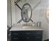 Bathroom with marble countertop, dark vanity, and decorative black lines at 1647 S Plateau Cir, Martinsville, IN 46151