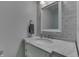 Bathroom featuring marble countertops, tiled walls, and a modern sink at 1772 Woodridge Pl, Greenwood, IN 46143