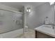Bathroom features a shower and tub combo with glass doors, toilet, and a sink with a vanity at 1772 Woodridge Pl, Greenwood, IN 46143