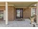 Welcoming front porch with a beautiful glass front door at 1772 Woodridge Pl, Greenwood, IN 46143