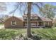 Attractive home with a well-manicured lawn and mature trees at 1772 Woodridge Pl, Greenwood, IN 46143