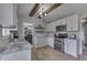 Beautiful kitchen with wood beams, granite countertops, and stainless steel appliances at 1772 Woodridge Pl, Greenwood, IN 46143