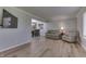 Bright living room featuring modern flooring at 1772 Woodridge Pl, Greenwood, IN 46143