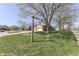 Neighborhood view of a home with mature trees and well-kept lawns at 1772 Woodridge Pl, Greenwood, IN 46143
