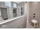 Modern bathroom with a glass shower enclosure featuring gray tile work and multiple shower heads at 19414 Mcbee Ave, Westfield, IN 46074