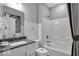Clean bathroom features a shower-tub combo, white subway tile, and sleek fixtures at 19414 Mcbee Ave, Westfield, IN 46074