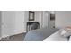 Bedroom with built-in desk, ample closet space, and soothing decor at 19414 Mcbee Ave, Westfield, IN 46074
