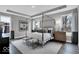 Modern main bedroom with a four-poster bed, neutral colors, and stylish furnishings at 19414 Mcbee Ave, Westfield, IN 46074