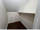 Walk-in closet featuring a hanging rod and storage cubby at 2029 Winton Ave, Indianapolis, IN 46224