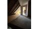 Open attic with plywood subfloor and doorway offering potential for storage or build out at 2157 S Meridian St, Indianapolis, IN 46225