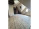 Unfinished attic space with wooden flooring and window, ready for customization at 2157 S Meridian St, Indianapolis, IN 46225