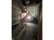 Attic space showcases wood frame, unfinished walls, with a rough-in for a future bathroom at 2157 S Meridian St, Indianapolis, IN 46225