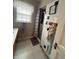 Bathroom featuring a shower and black and white tile at 216 Golf Club Rd, Anderson, IN 46011