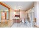 Bathroom with a vanity, toilet, bathtub with shower, and decorative wallpaper at 2215 W State Rd, Pendleton, IN 46064