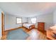Bedroom features hardwood floors, natural light, and ample space for relaxation at 2215 W State Rd, Pendleton, IN 46064