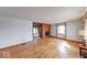 Inviting living room with hardwood floors and a cozy brick fireplace at 2215 W State Rd, Pendleton, IN 46064