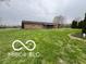Expansive backyard with lush green grass, perfect for outdoor activities and relaxation at 2227 S County Road 300 E, Danville, IN 46122
