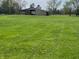 Spacious barn with a neutral color scheme and a vast green yard in a serene, rural setting at 2227 S County Road 300 E, Danville, IN 46122