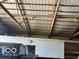 View of the barn's interior highlighting the wooden structure and ceiling with a truck visible at 2227 S County Road 300 E, Danville, IN 46122