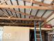 Interior view of a barn with exposed wooden beams and a ladder at 2227 S County Road 300 E, Danville, IN 46122