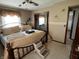 Bedroom with a decorative bed, wall decor, and stairs for pets at 2227 S County Road 300 E, Danville, IN 46122