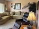 Comfortable living room with plush sectional sofa, recliner, and soft lighting at 2227 S County Road 300 E, Danville, IN 46122