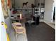Workshop area with storage, table, chairs, and horse decoration at 2227 S County Road 300 E, Danville, IN 46122