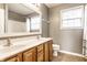 The bathroom has a large vanity with a double sink and a large mirror at 2615 N Delaware St, Indianapolis, IN 46205