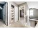 This is a hallway with a closet and a view into another bedroom at 2615 N Delaware St, Indianapolis, IN 46205